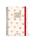 Cahier A5 à spirale Ourson de Legami, couverture et fermeture élastique sur fond blanc