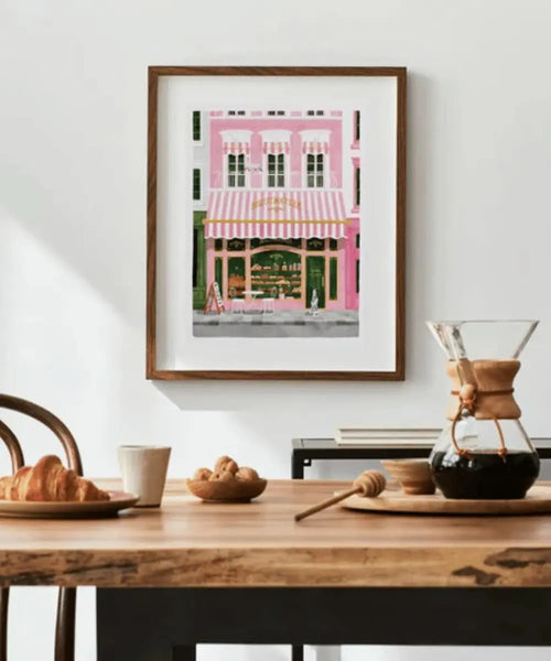 Affiche 50 x 70 cm Pink Bakery de la marque All The Ways To Say, encadrée et exposée dans un salon