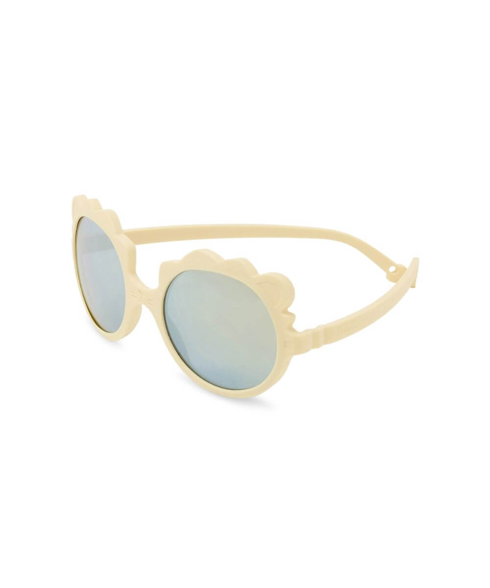 Lunettes Lion Vanille de la marque KI ET LA, sur fond blanc, vue de biais