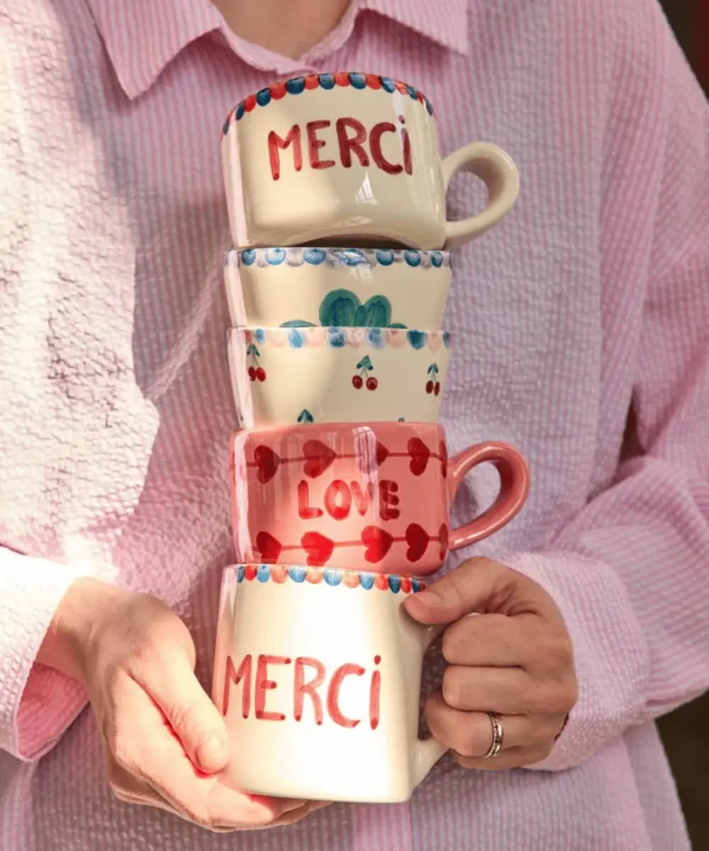 Mug en Céramique Merci de Rice dans les mains d'une personne