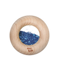 Hochet d'éveil anneau dentition Donut sensoriel en bois et paillettes bleues de la marque Petit Boum.