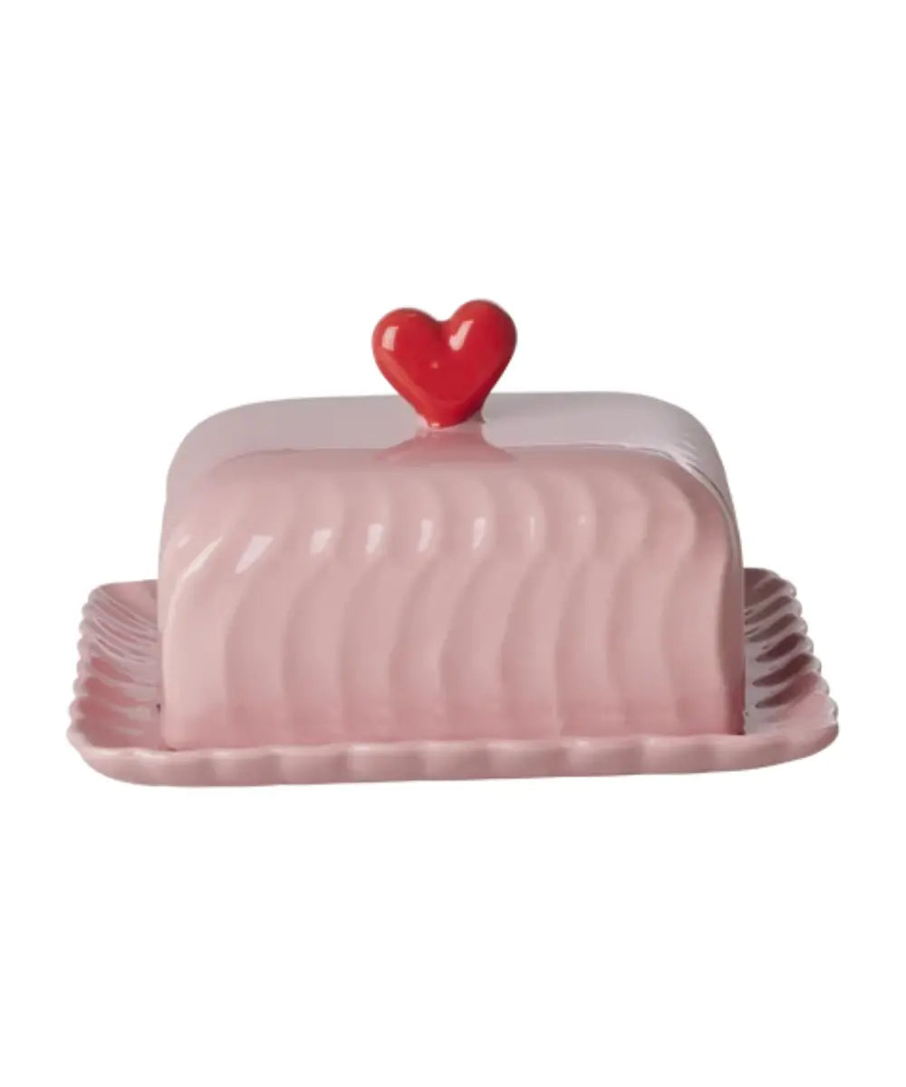 Vue de face du Beurrier en céramique rose et coeur rouge de la marque danoise Rice