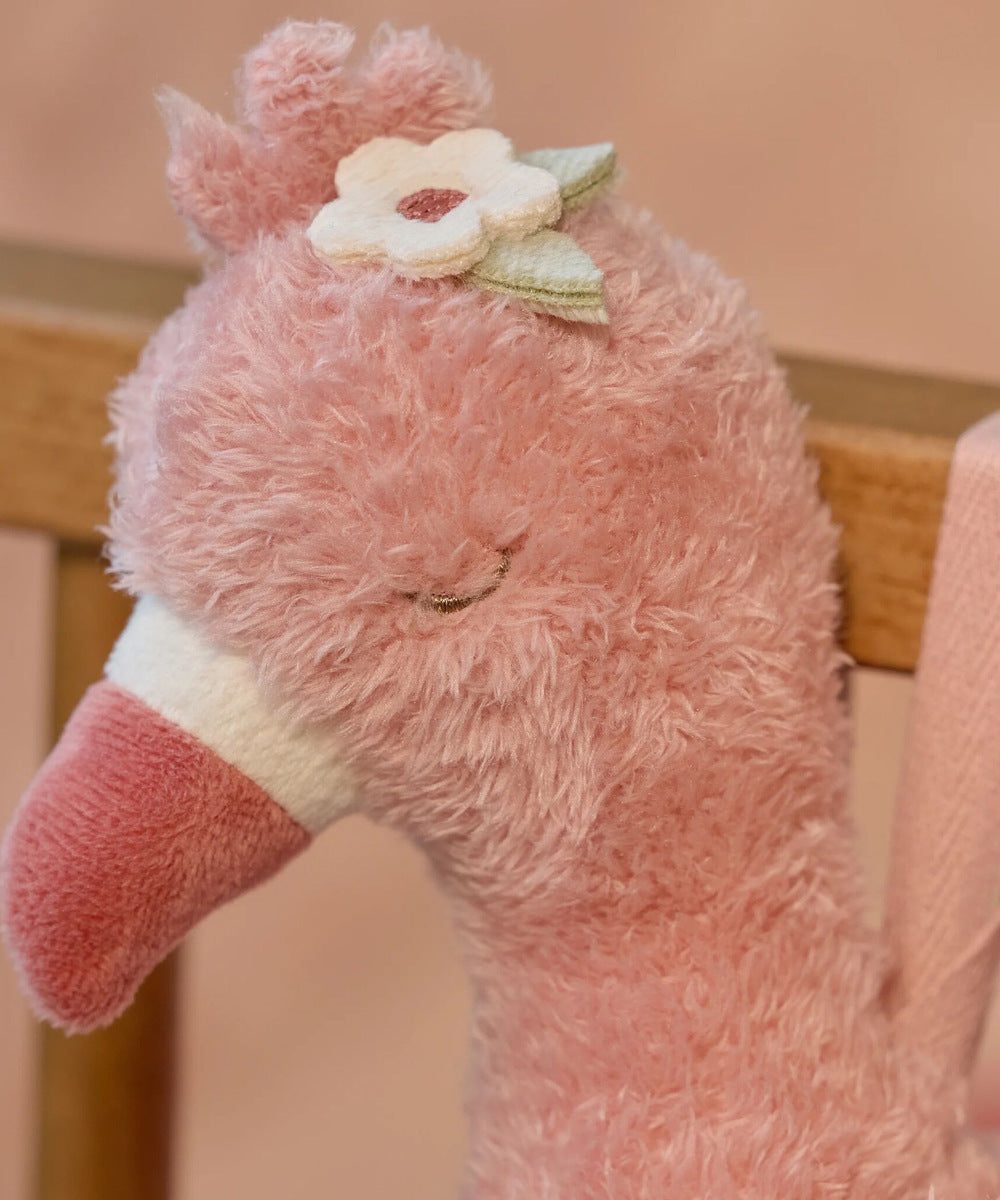 Détail de la tête fleurie de la boîte à musique flamant rose