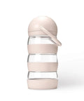 Boite doseuse de lait evolutive so mimi elhee avec compartiments hermetiques et anse amovible.