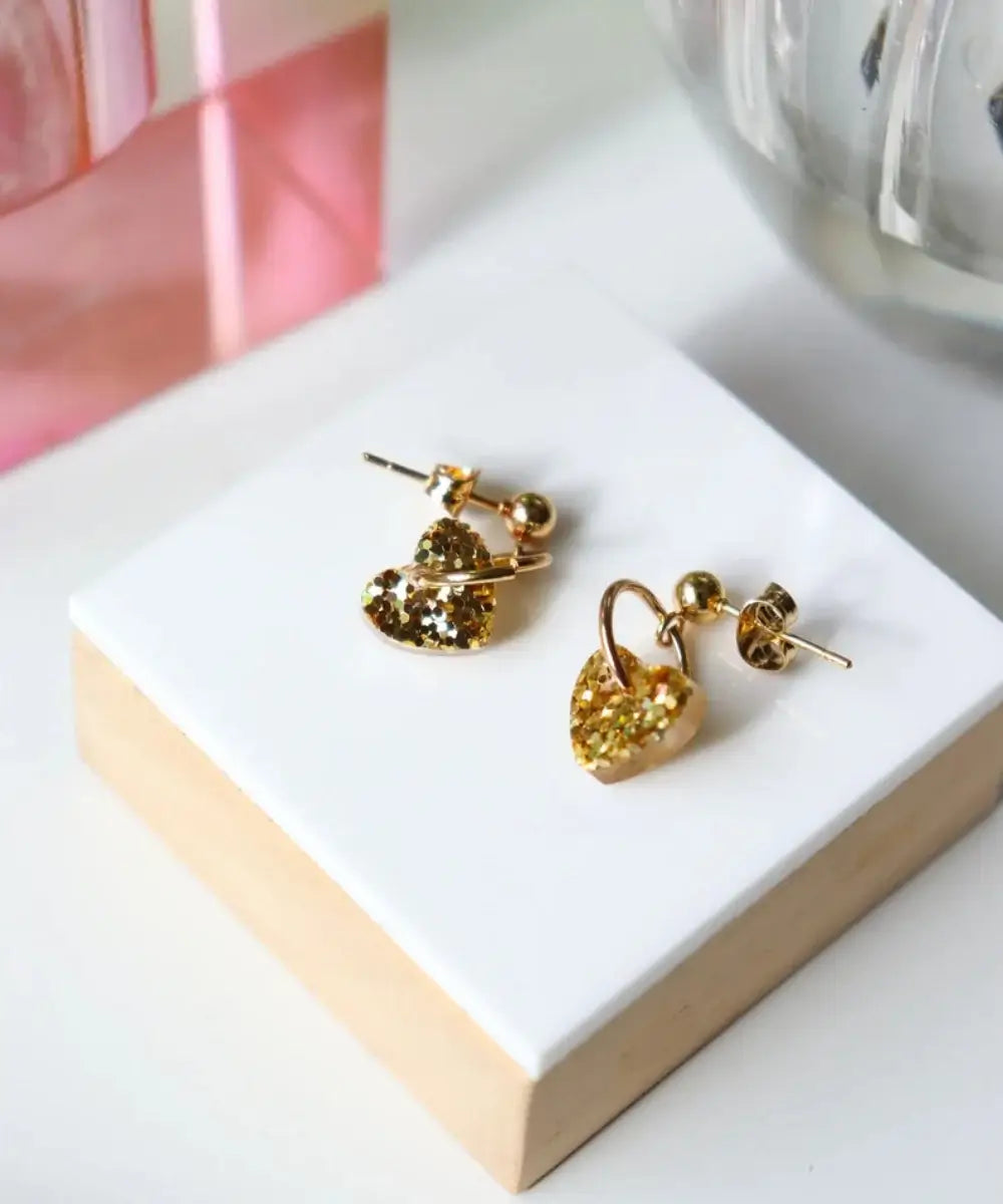 Boucles d'oreilles Lucie Or en résine pailletée