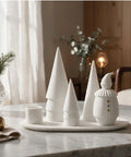 Bougeoir pere noel en porcelaine blanche et details dores par rader.