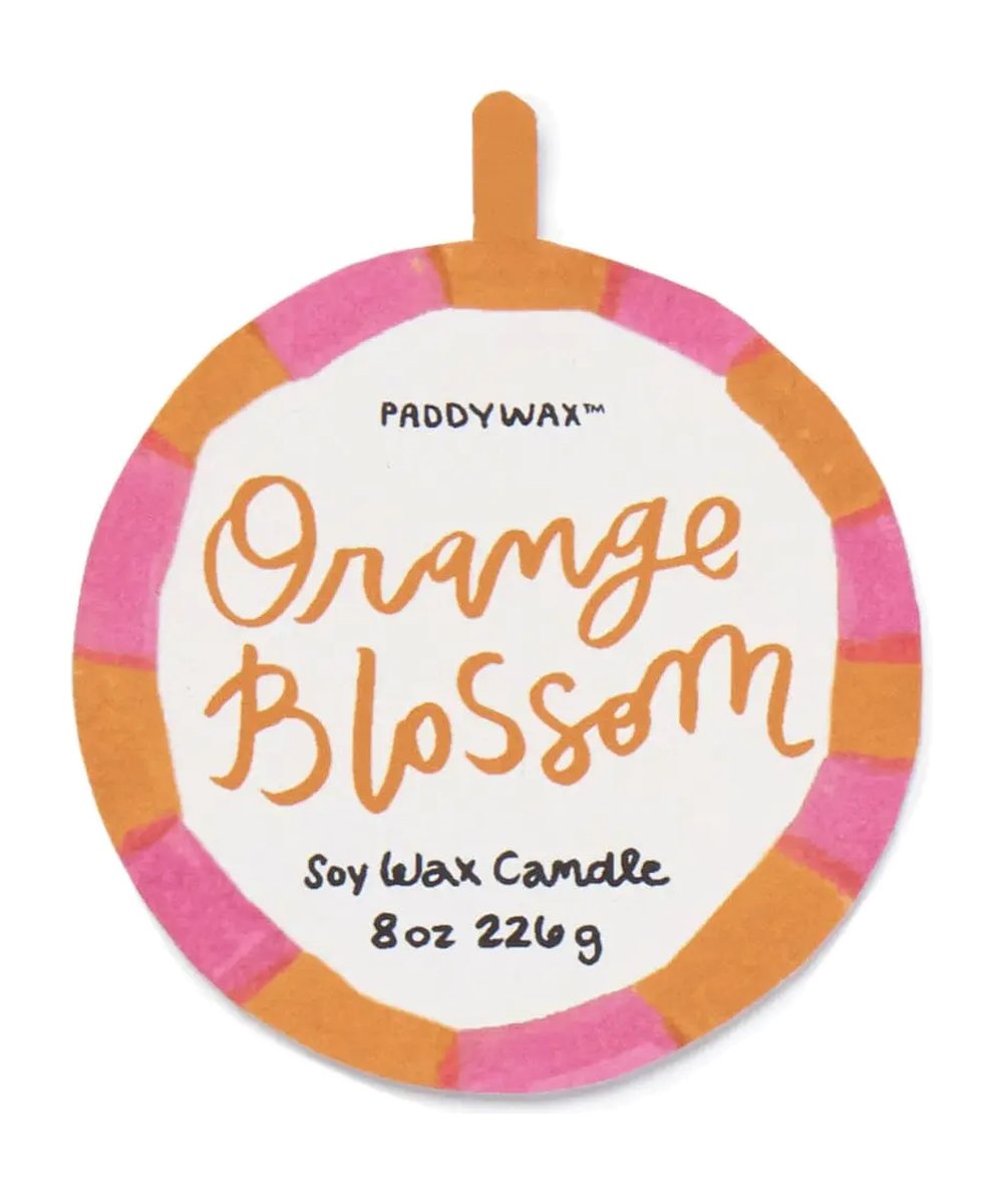 Gros plan de Bougie Adopo Soleil Orange Blossom de la marque Paddywax, sur fond blanc