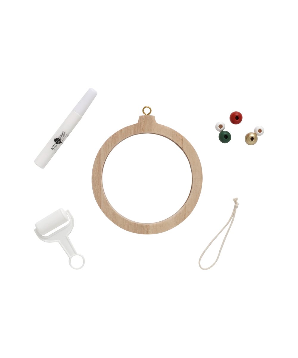 Vue produit de Boule de Noël empreinte transparente de la marque Petit Artichaut, sur fond blanc