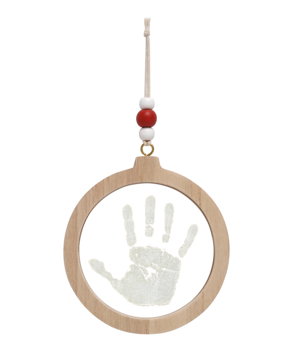 Vue produit de Boule de Noël empreinte transparente de la marque Petit Artichaut, sur fond blanc