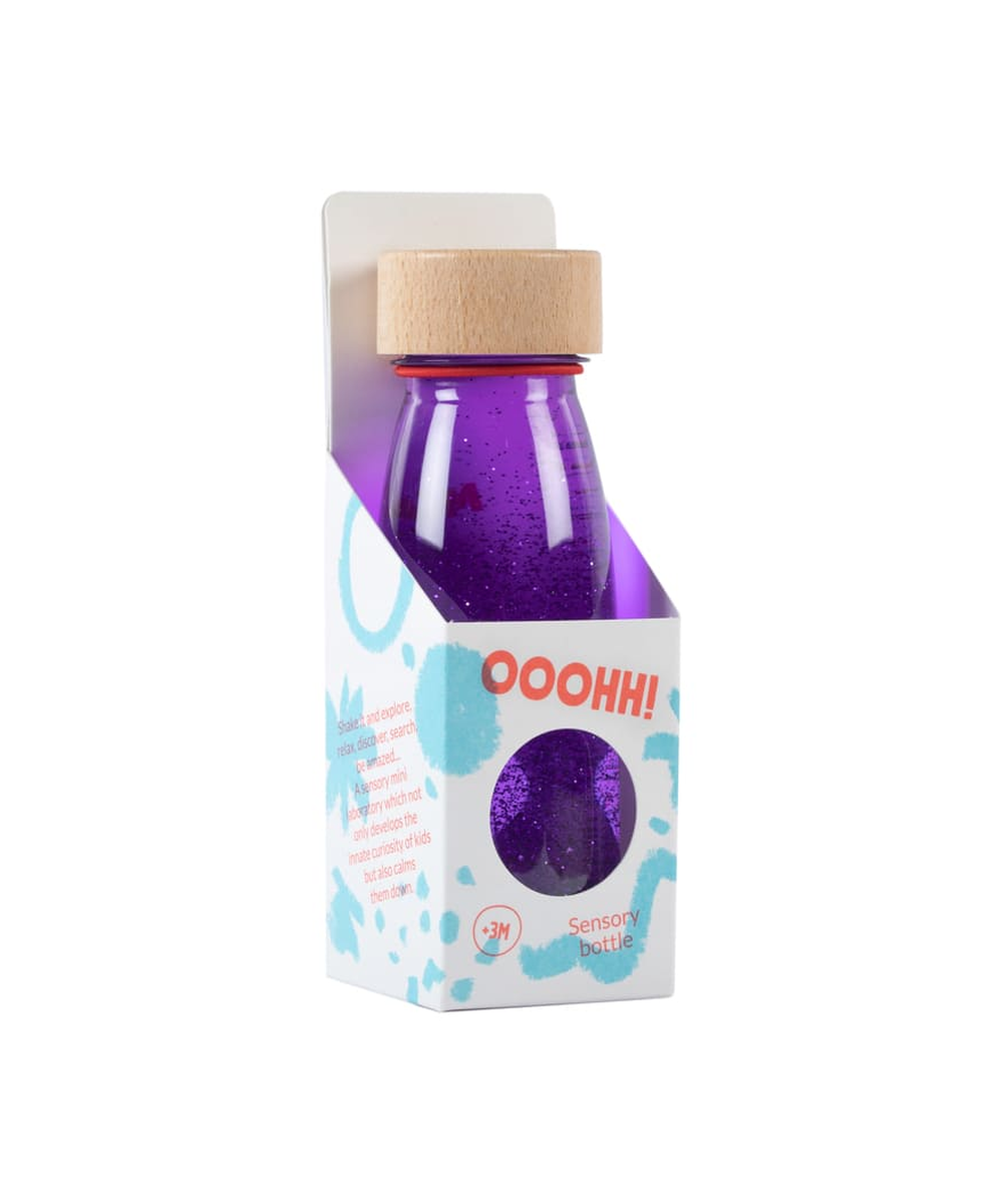Bouteille sensorielle Float violette avec éléments flottants de Petit Boum