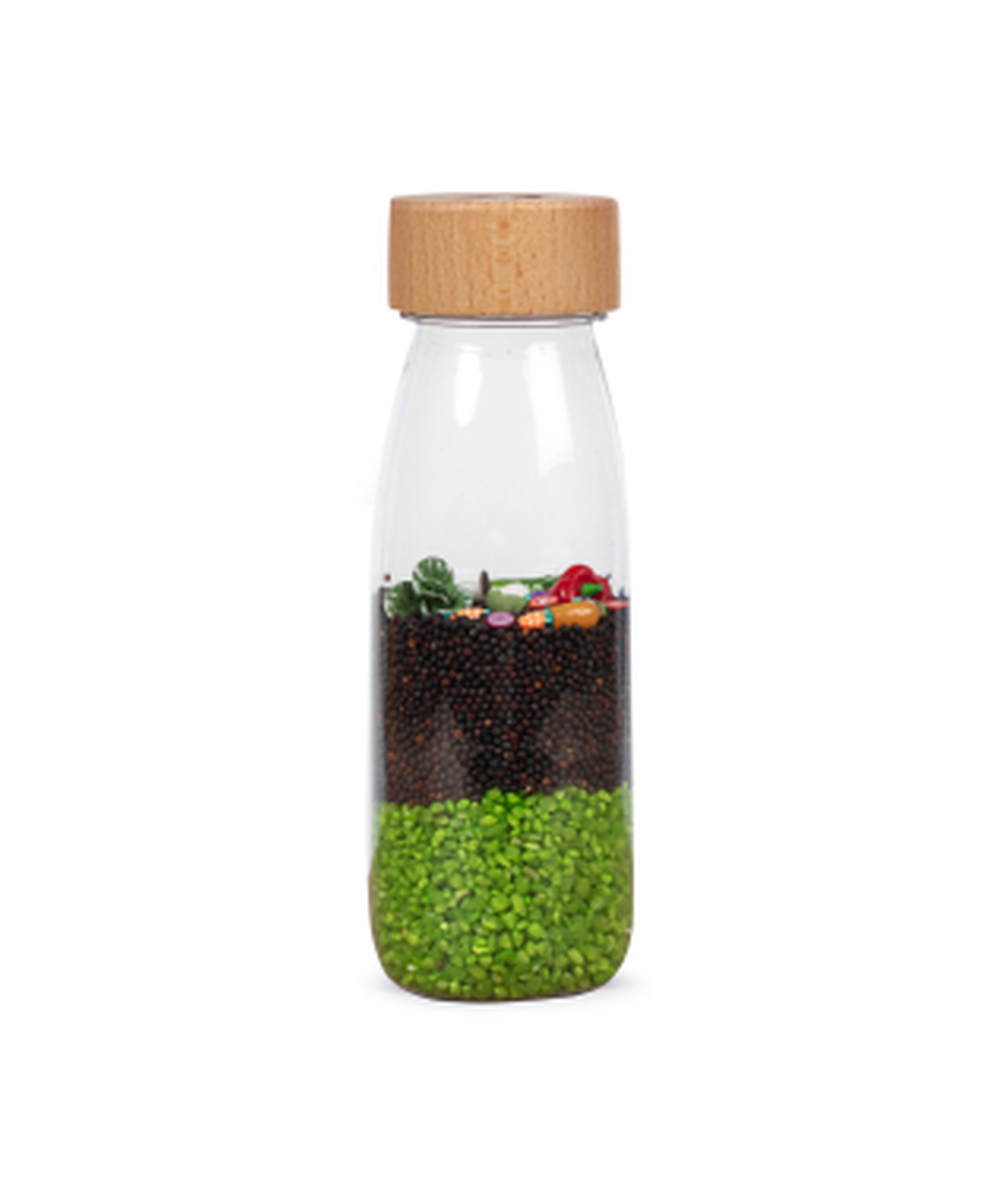 Bouteille sensorielle Learn Légumes avec potager miniature de Petit Boum
