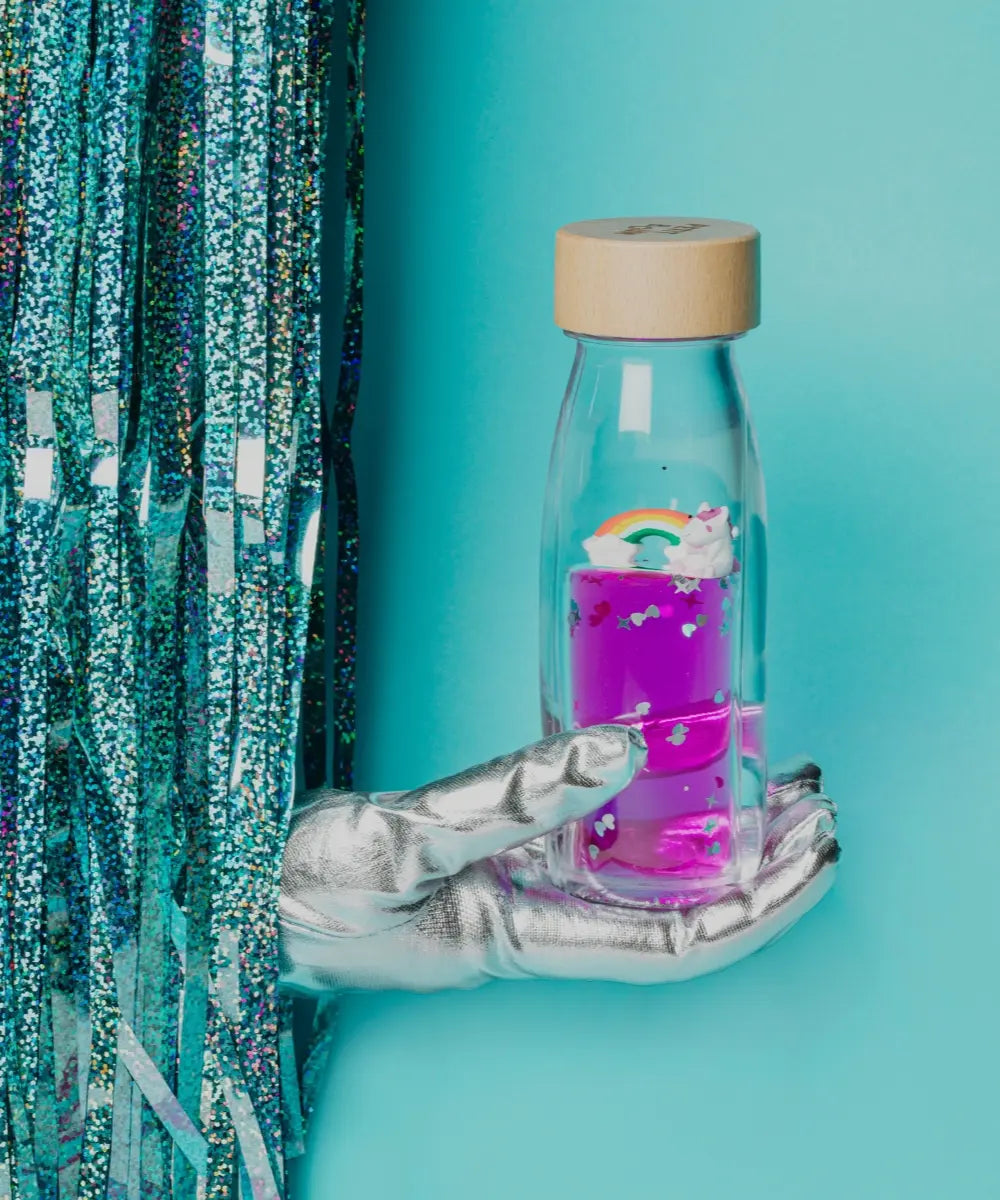 Bouteille sensorielle move magic rainbow licorne et arc en ciel petit boum.