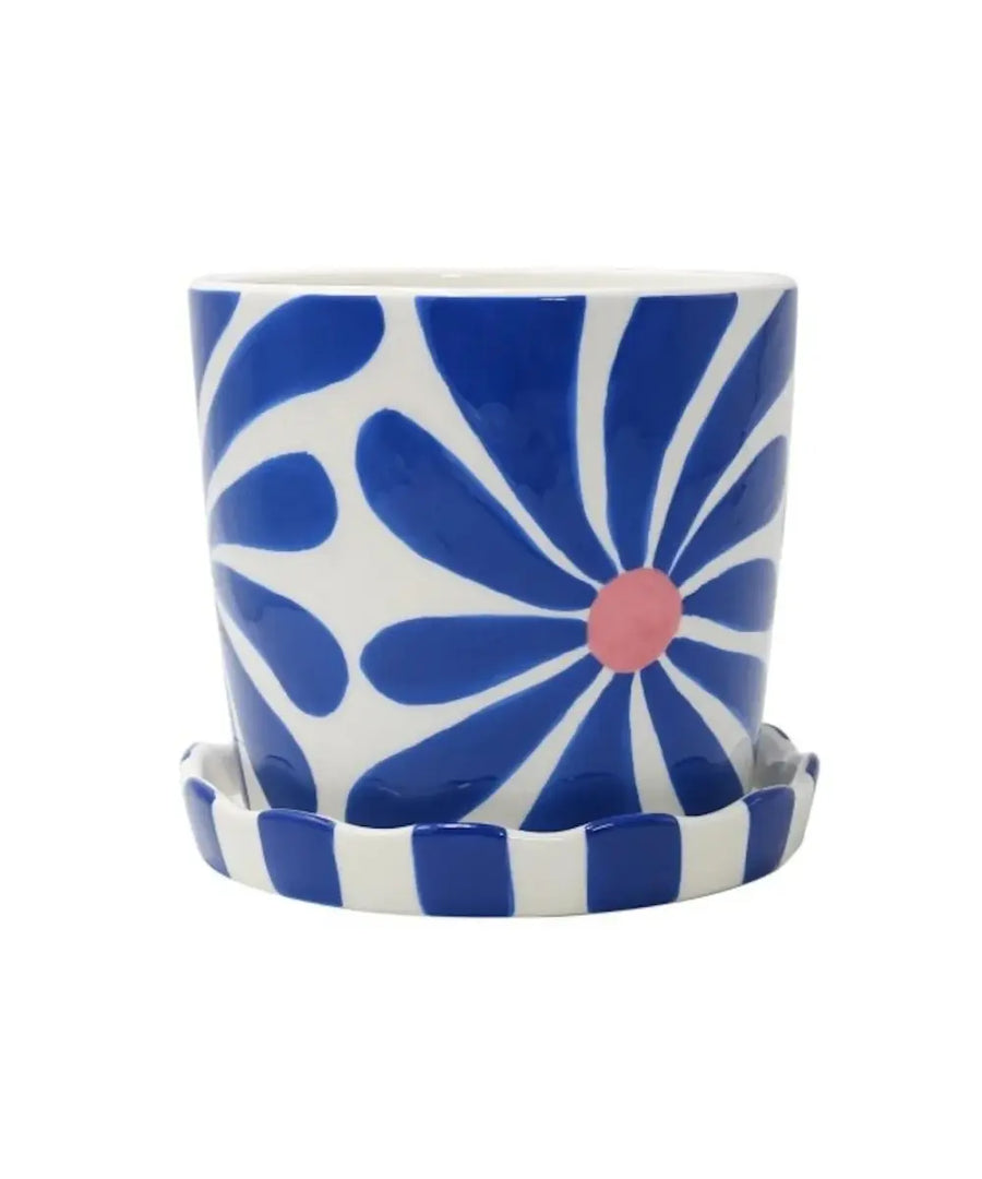 Pot de fleurs moderne en céramique bleu et blanc avec motifs de fleurs peints à la main et soucoupe rayée Qué Rico.