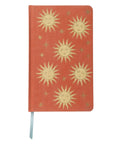 Carnet de notes en tissu terracotta avec couverture en toile et motifs celestes soleil.