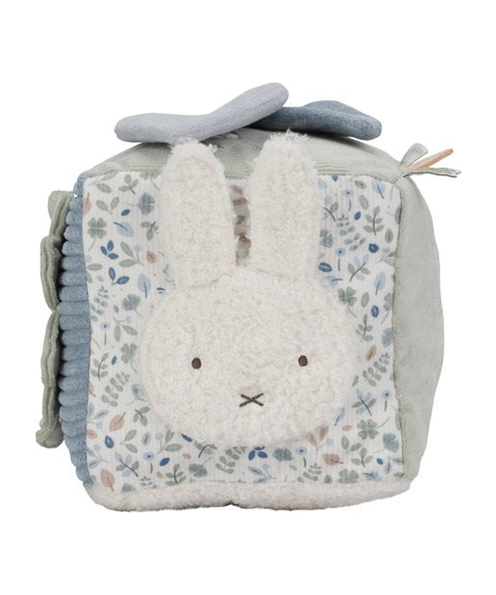 Face Miffy et motifs Lucky Leaves du cube d’activités sur fond blanc