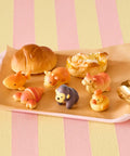 Mini figurine mystère surprise en plastique de la collection Animal Bakery Série 3 en forme de petit animal gourmand