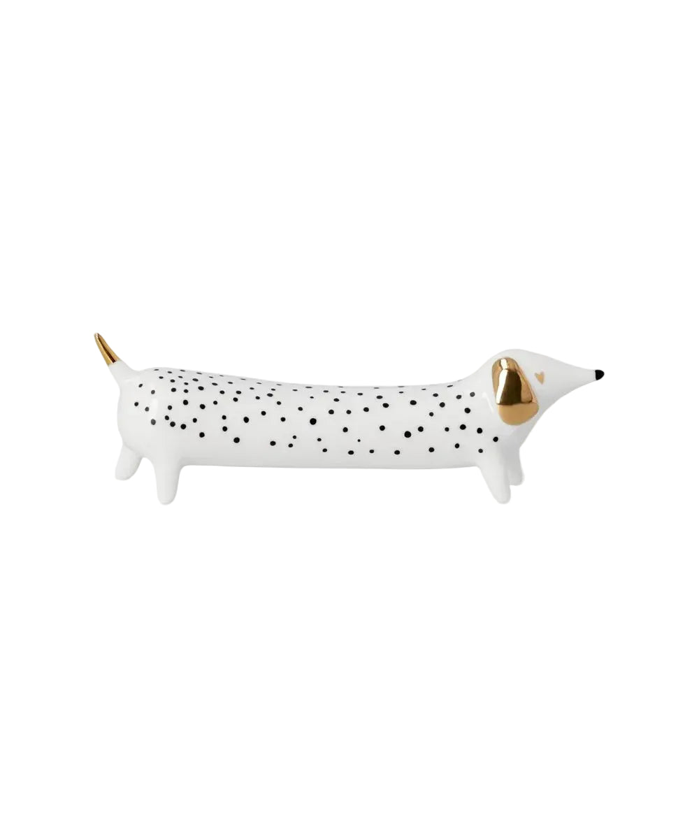 Vue produit de Figurine teckel Petits pois de la marque Räder, sur fond blanc