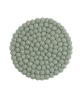 Grand dessous de verre vert clair poudré de la marque Gry & Sif, sur fond blanc