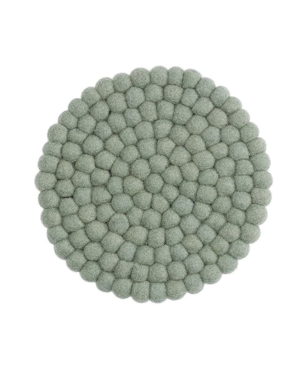 Grand dessous de verre vert clair poudré de la marque Gry & Sif, sur fond blanc