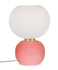 Grande lampe à poser Adonis Rose sur un fond blanc