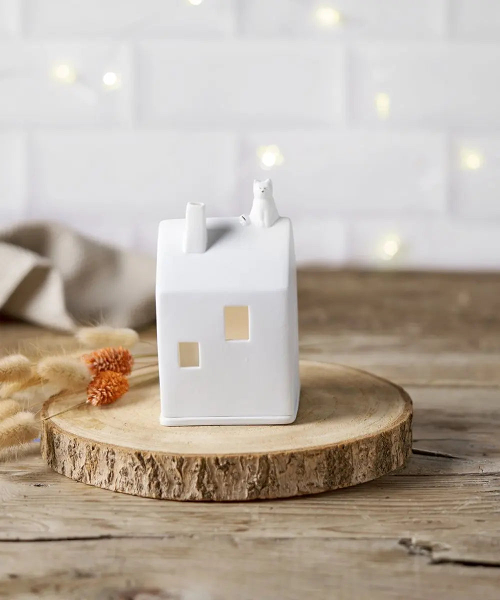 Photophore maison « Chat » Räder en situation posé sur une table