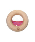 Hochet d'éveil anneau dentition Donut sensoriel en bois rose de la marque Petit Boum.