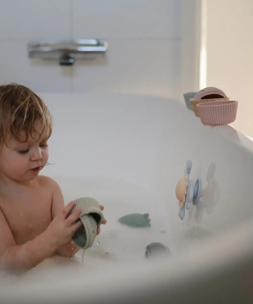 Jouets pour le bain en forme de cupcakes de la marque Mushie