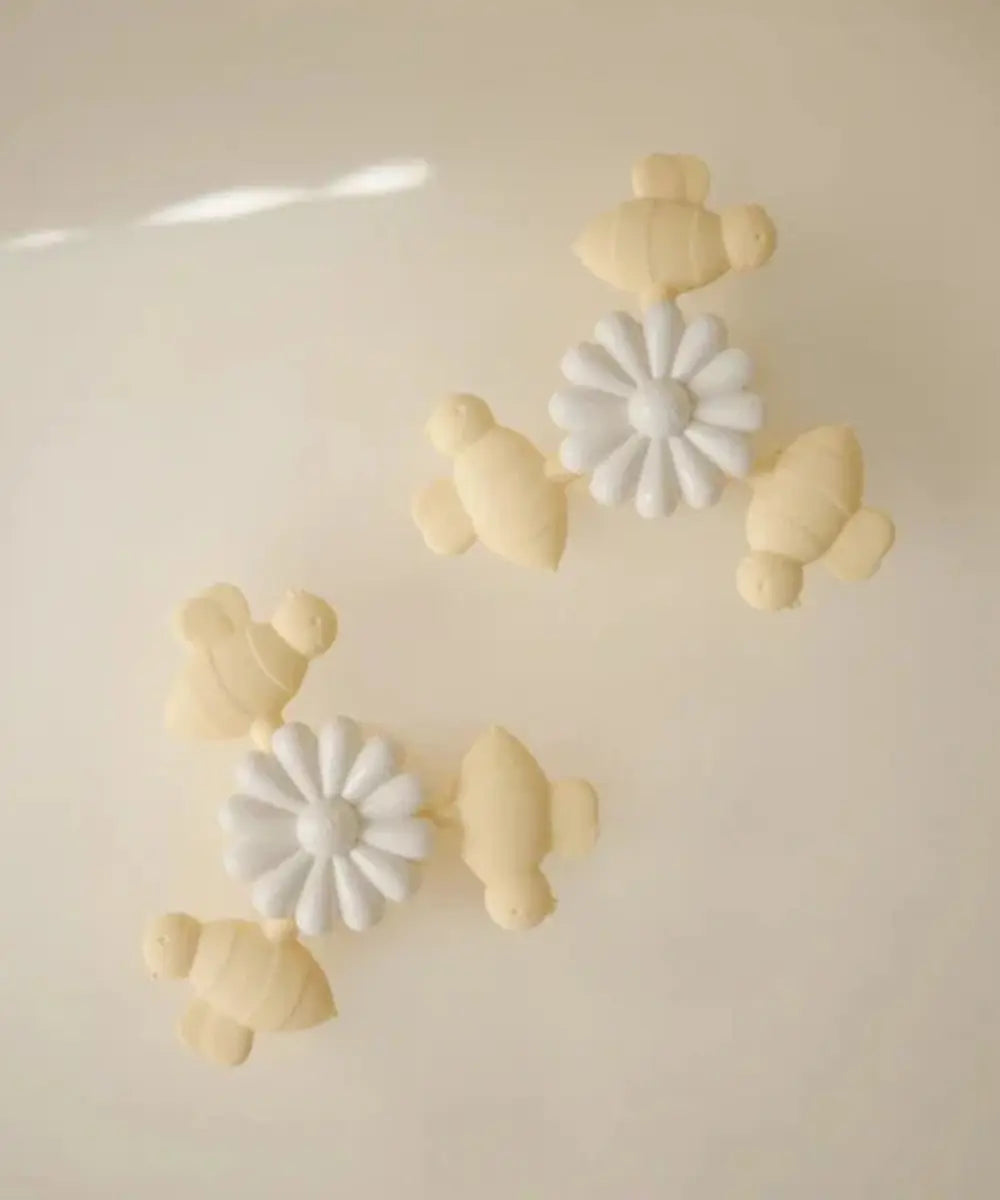 Jouet rotatif sur ventouse Abeilles de la marque pour enfants, Mushie