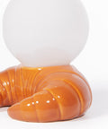 Détail du socle croissant et du globe lumineux