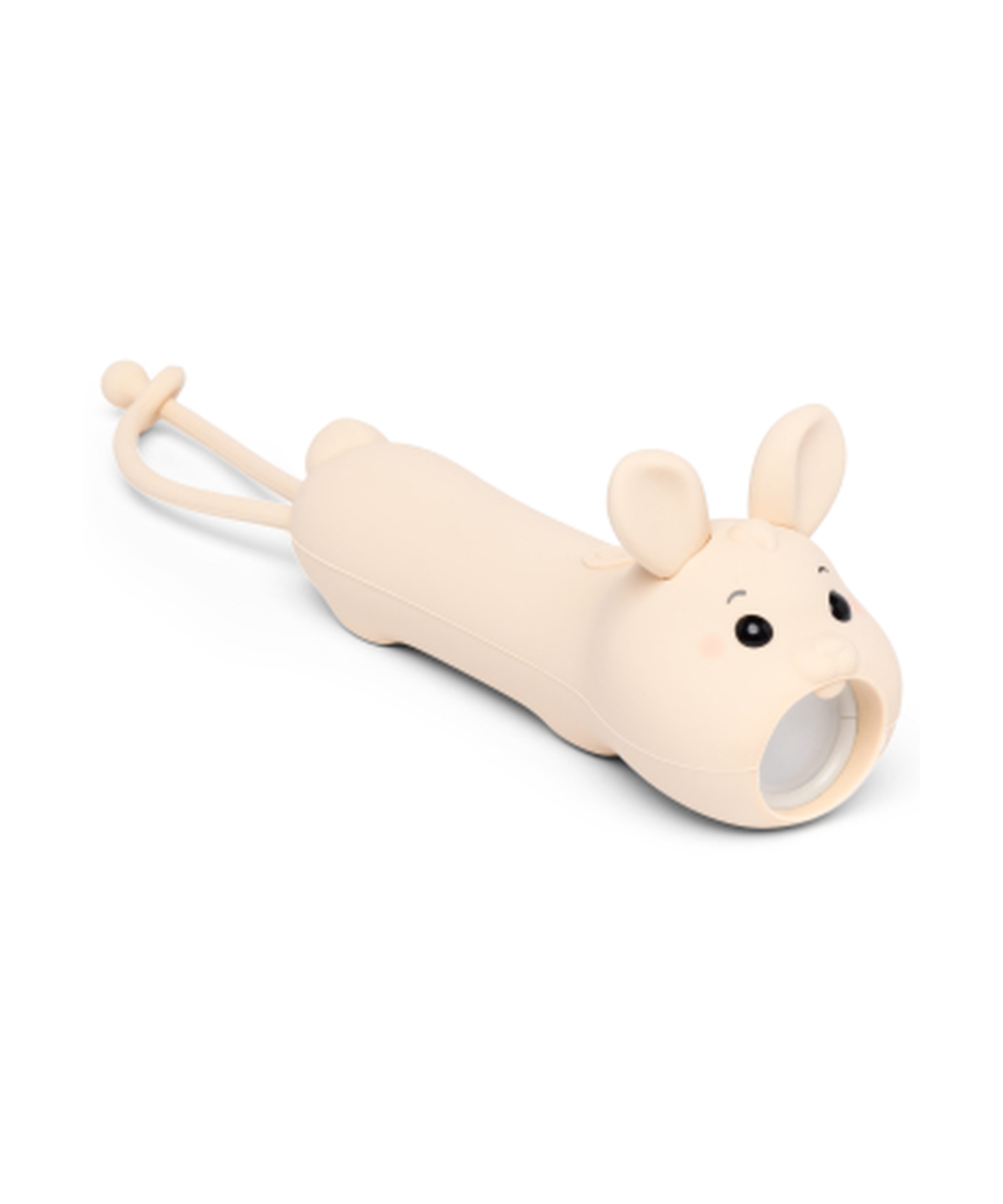 Lampe torche nomade en silicone souple forme de lapin de la marque Little L, rechargeable usb-c.