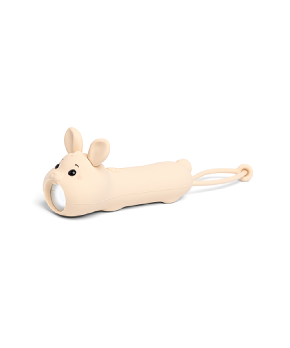 Lampe torche nomade en silicone souple forme de lapin de la marque Little L, rechargeable usb-c.