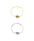 Lot de 2 bracelets Legami Better Together Abeille, motifs abeille et marguerite, présentés séparément sur fond blanc