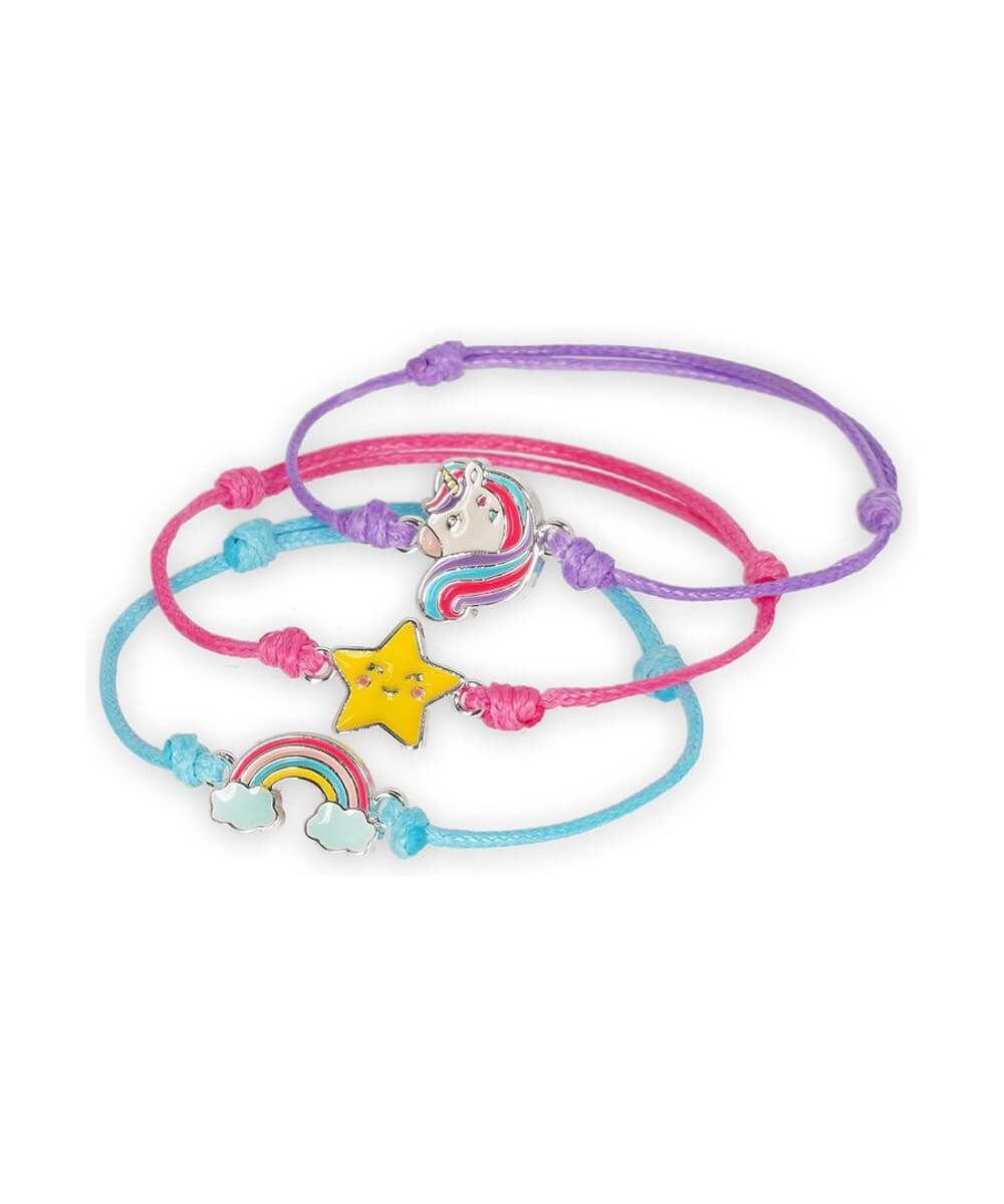 Bracelets réglables Legami Licorne avec breloques licorne, étoile et arc-en-ciel, vus en perspective sur fond blanc