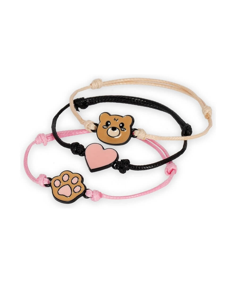 Bracelets réglables Legami Ourson avec breloques ourson, cœur rose et patte, vus en perspective sur fond blanc