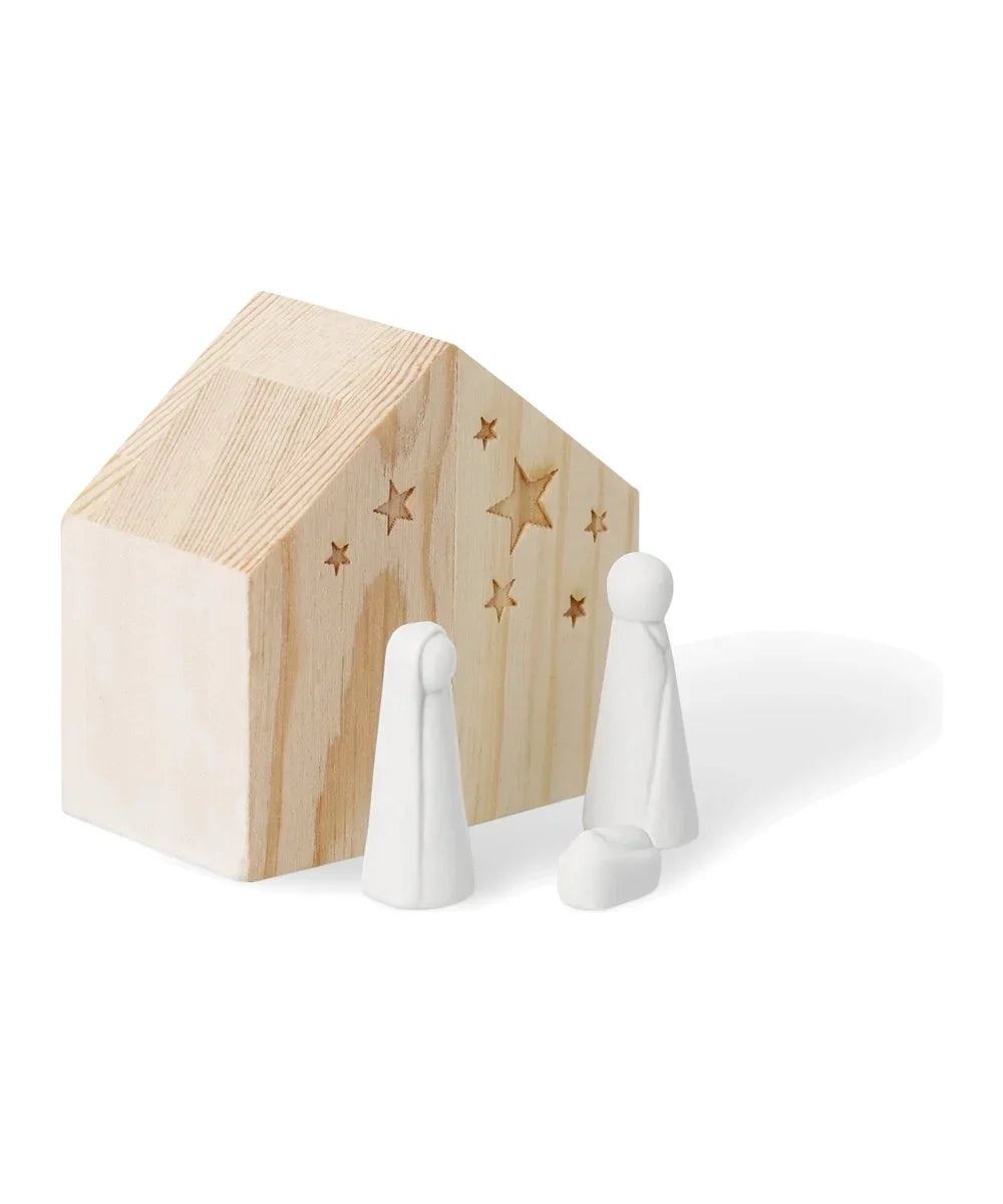 Mini crèche en bois et porcelaine de la marque Räder, sur fond blanc