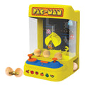 Pac-Man - Machine à pince - Borne d'arcade sur fond blanc