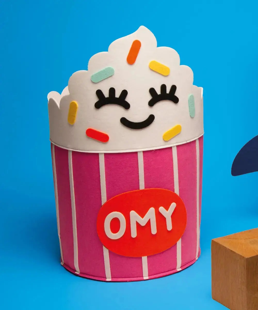 Photo présentant les détails du panier de rangement pour enfant Pop-Corn de la marque OMY