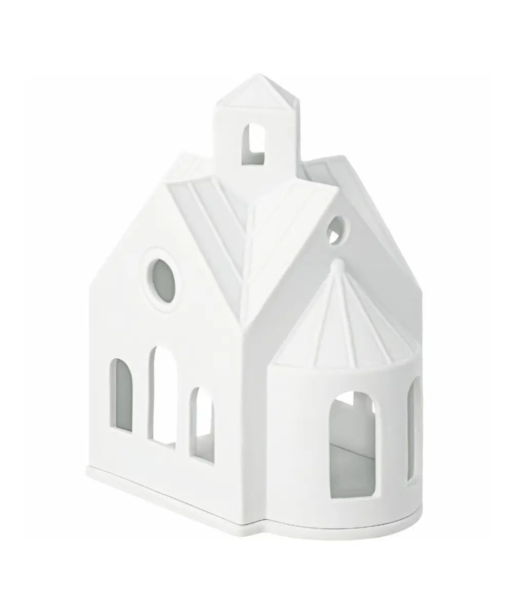 Maison photophore en porcelaine blanche mate chapelle de montagne rader avec fenetres ajourees.