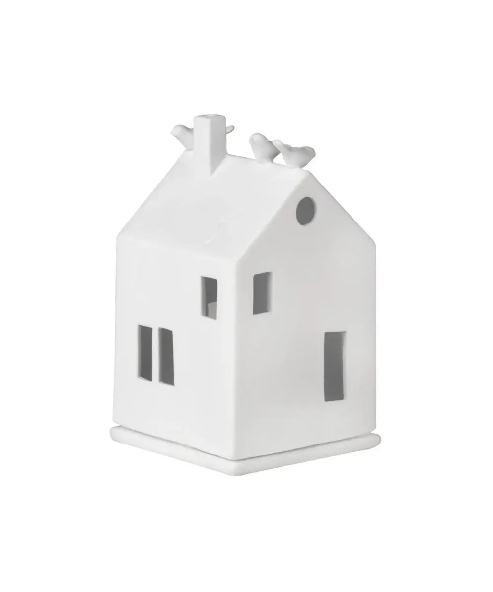Photophore maison en porcelaine blanche de la marque Räder avec petits oiseaux perchés sur le toit.