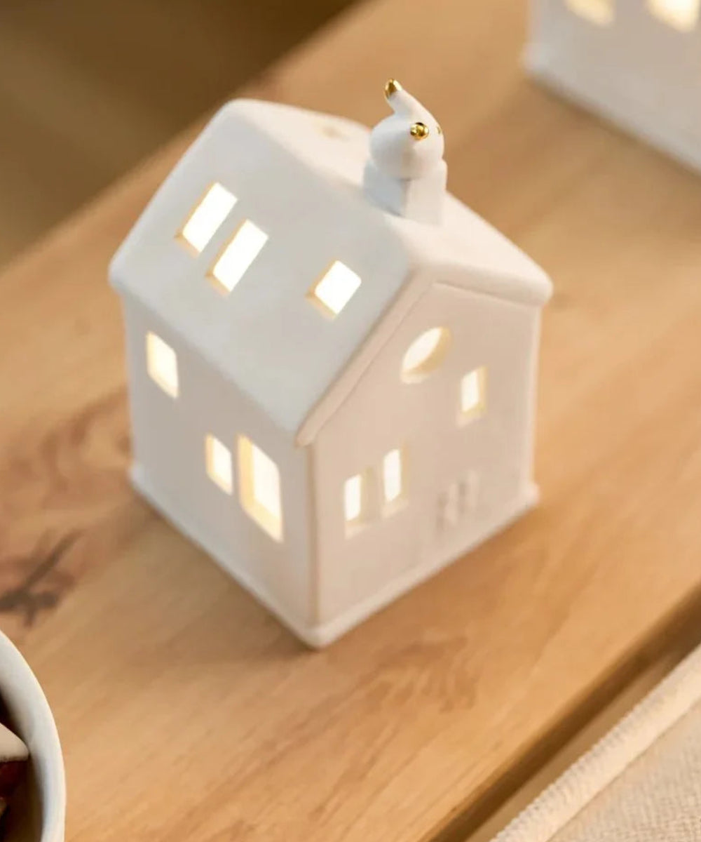 Gros plan en situation de Photophore maison Petits pas du Père Noël de la marque Räder