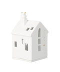 Maison photophore en porcelaine blanche Petits pas du Père Noël de rader avec fenetres ajourees pour bougie.