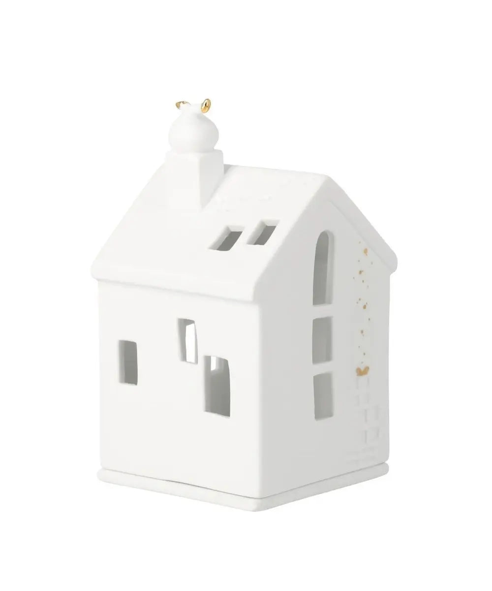 Maison photophore en porcelaine blanche Petits pas du Père Noël de rader avec fenetres ajourees pour bougie.