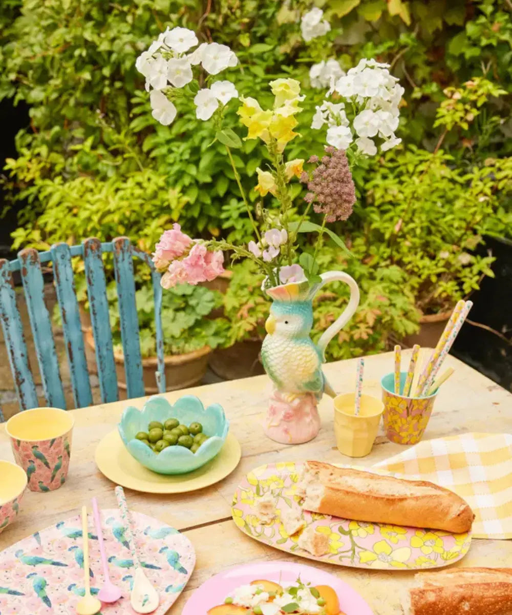 Pichet en céramique Oiseau contenant un bouquet de fleurs