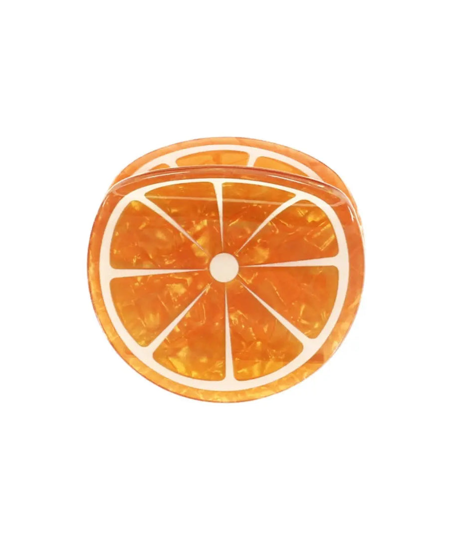Pince à cheveux Orange sur fond blanc
