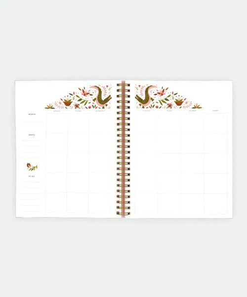 Carnet de planification mensuelle rose pastel motif crocodile avec spirales dorées de la marque All The Ways To Say.