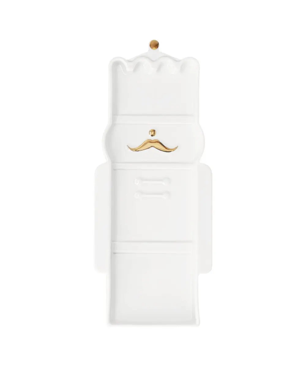 Petit plat en porcelaine blanche en forme de casse noisette rader pour table de noel.