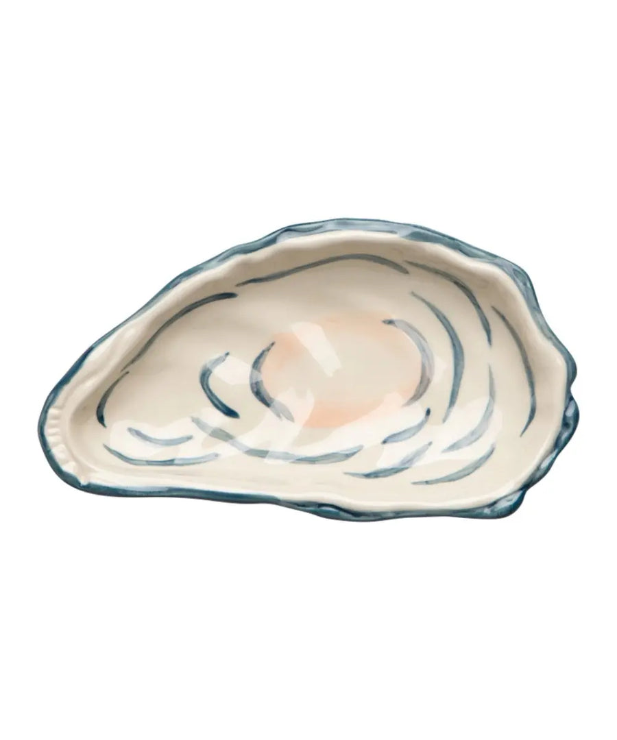 Petit plat en forme d'huître et réalisé en grès.