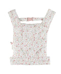 Porte-bébé jouet pour poupée Little Dutch avec imprimé floral rose et bretelles rembourrées.