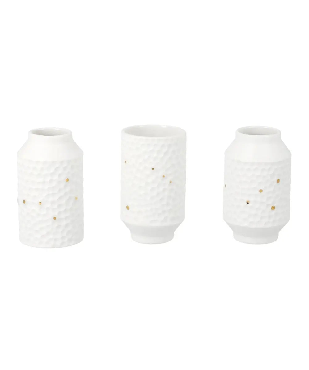 Set de 3 mini vases en porcelaine blanche avec reliefs et motifs etoiles Räder.