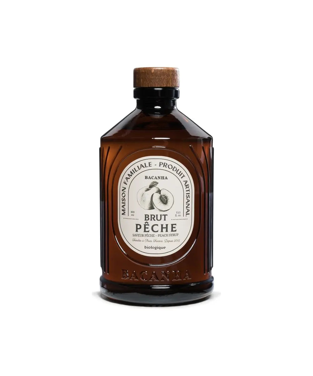 Sirop Brut de Pêche Bio Bacanha vu de face sur fond blanc